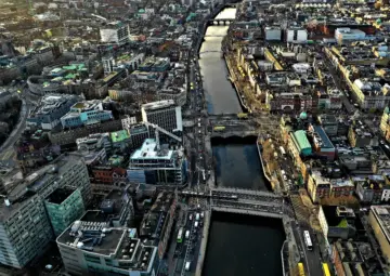 Aerial image of buildings in Dublin city centre with the river liffey running through the city