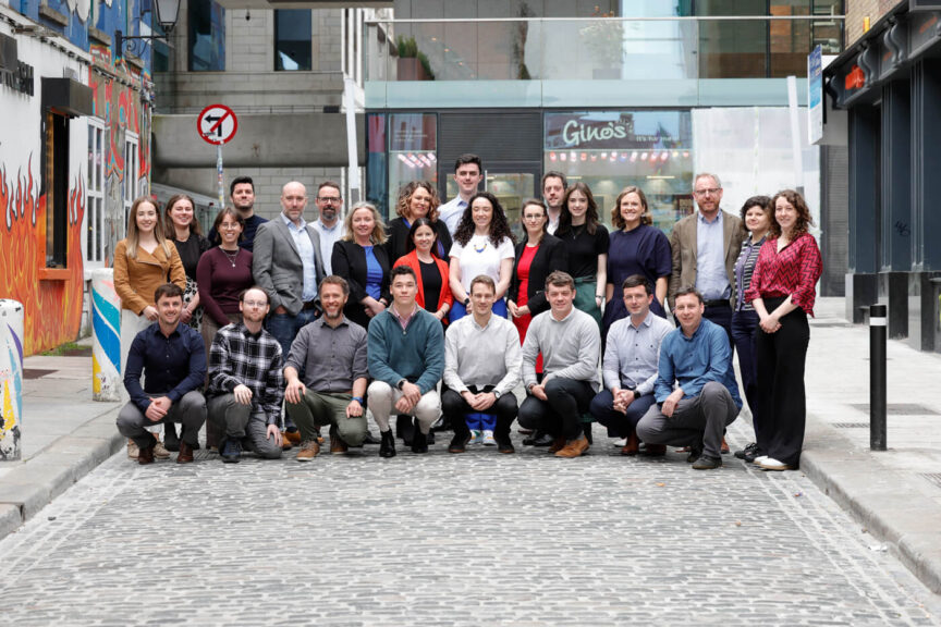 Image of the Codema team. A large group smiling at the camera in Temple Bar