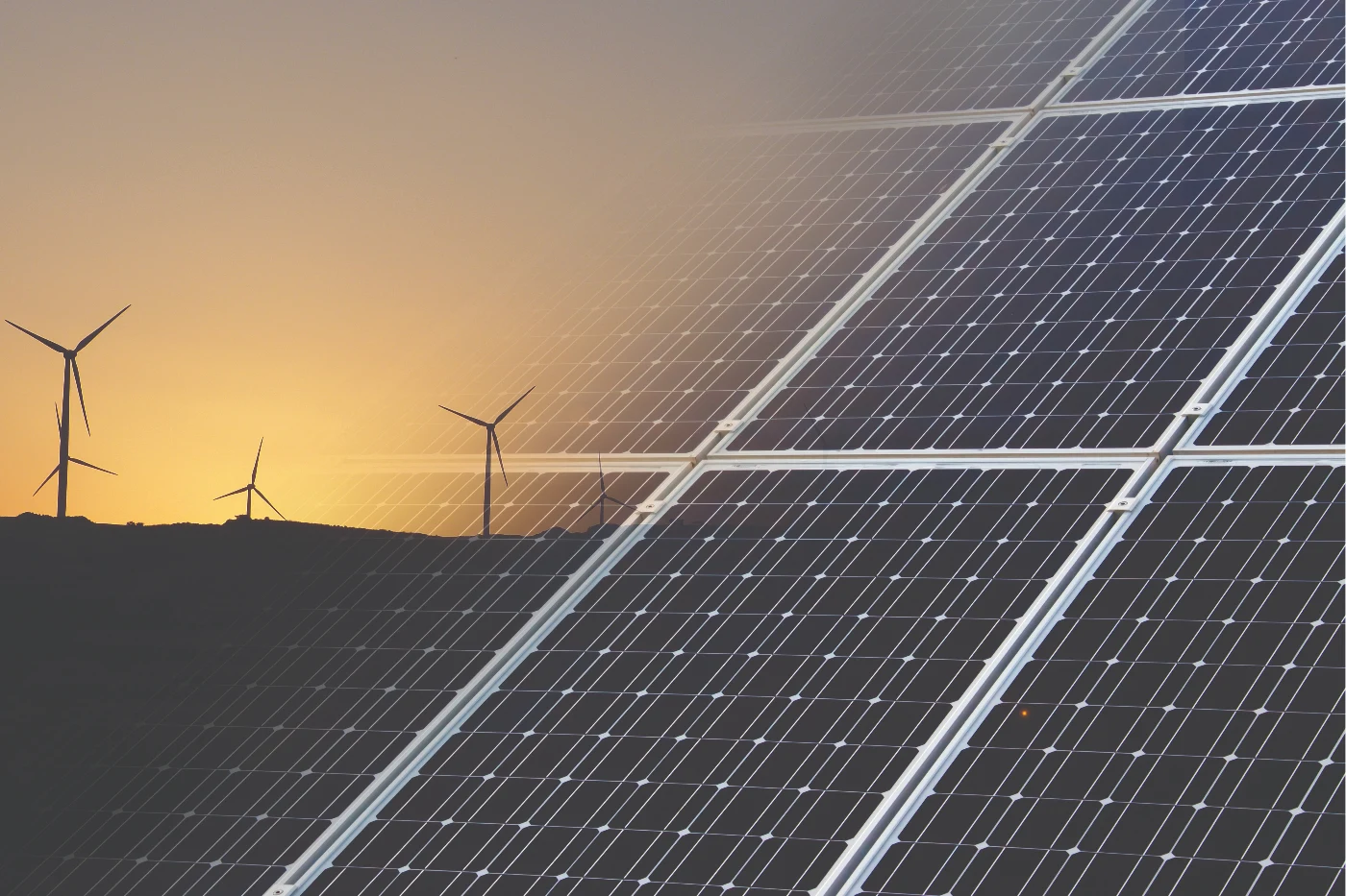 Image of wind farm fading into solar panels