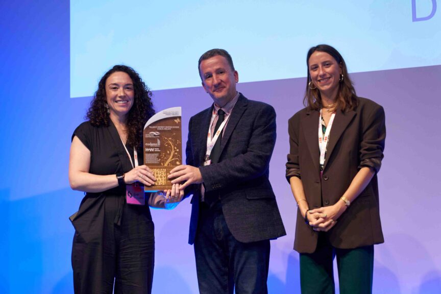 Donna Gartland and Admir Shala accept award at the Global District Energy Climate Awards