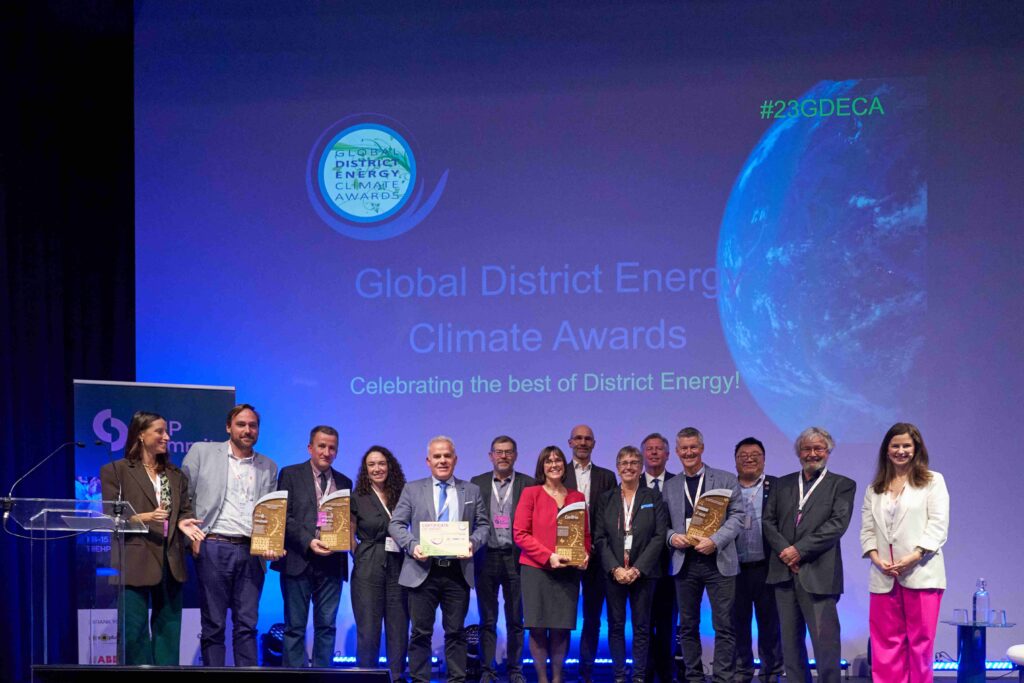 Image of a group of people on stage at the Global District Energy Climate Awards