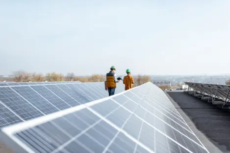 Picture of people installing solar panels.