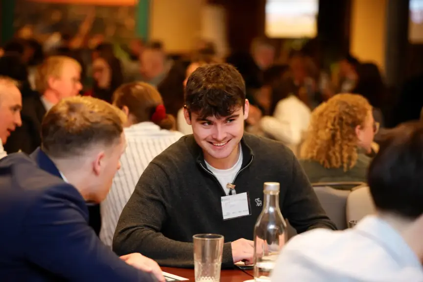 Picture of people talking around a table at the Decarbonising Dublin Summit.