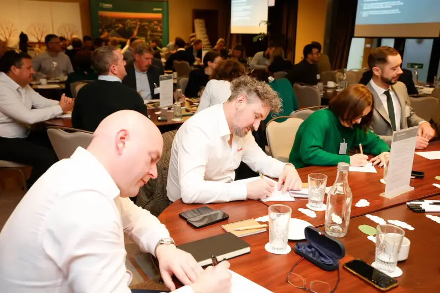 Picture of participants taking part in audience exercise at the Decarbonising Dublin Summit.