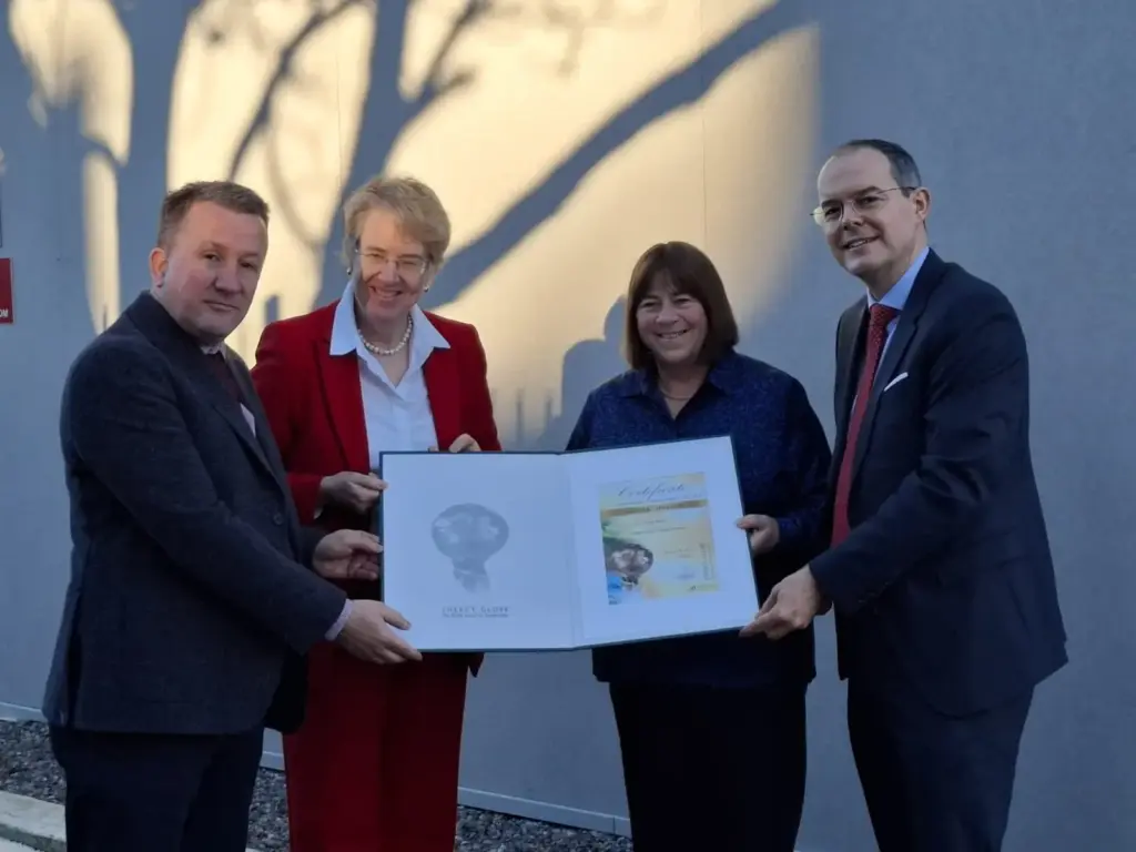 Image of Admir Shala and Teresa Walsh being presented the Energy Globe Award.